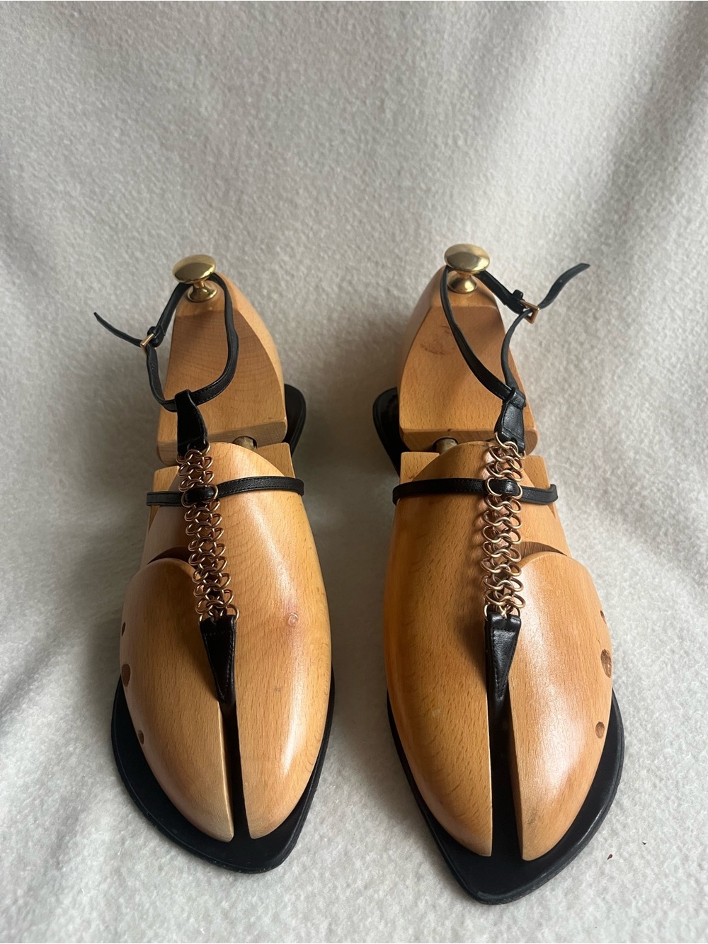 Prada Black Leather T-Strap Sandals with Gold Chain Accent